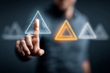 High quality photo of person holding an exclamation mark with a triangle on their hand, signifying a warning or point of attention. The background is dark gray, and the focus is.