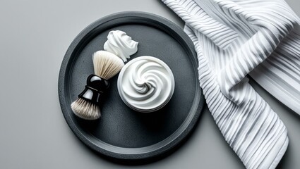 White Shaving Cream and Brush on Stone Tray with Striped Towel