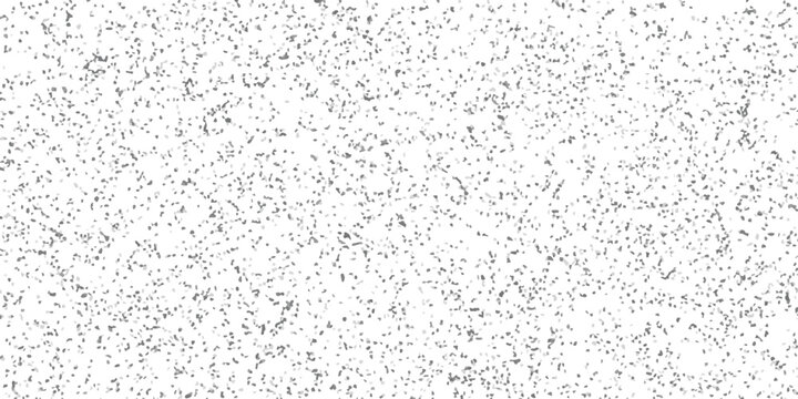 Abstract grey speckled background design with randomly scattered textured elements suitable for various creative applications