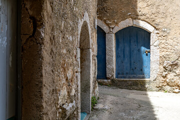 The narrowest street in the world, a narrow passage between the high walls of the old town, KRK in...