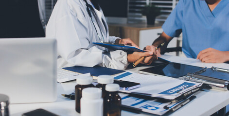 Young brunette woman having consultation at doctor office during