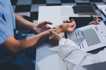 Young brunette woman having consultation at doctor office during