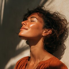 Woman with closed eyes, enjoying the sun, peaceful expression 