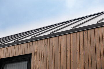 Modern Wooden House Facade With Black Window Trim