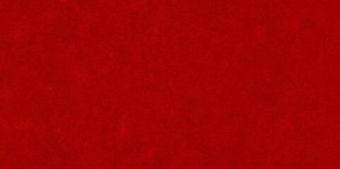 Fototapeta premium Abstract high-resolution red wall texture design with a slightly distressed and weathered surface. The wall features peeling paint, subtle cracks, rough plaster, and a gritty tactile feel.
