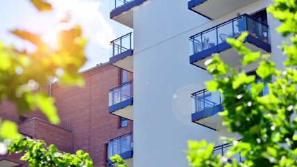 New modern block of flats in green area. complex. New modern block of flats in green area. European...