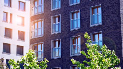 New modern block of flats in green area. complex. New modern block of flats in green area. European...