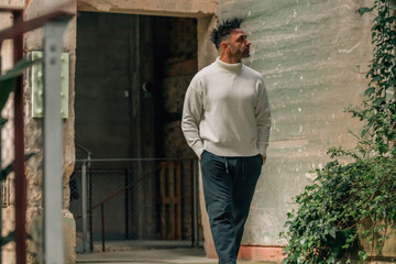 adult man visiting or traveling walking in ancient monument