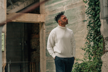 adult man visiting or traveling walking in ancient monument