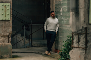 adult man visiting or traveling walking in ancient monument