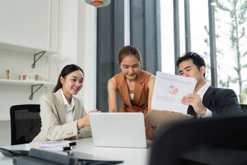 Collaborative Teamwork in Business. Professionals reviewing project data and insights in modern office.