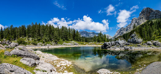 Double Lake (Dvojno jezero) in the Triglav Lakes Valley is surrounded by high mountains - the road...