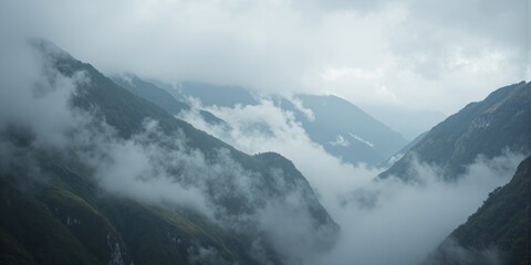 Misty Valley Layers Morning fog filling mountain crevices creating abstract horizontal stratification in cool blue-gray gradient without distinct geography. Elevated