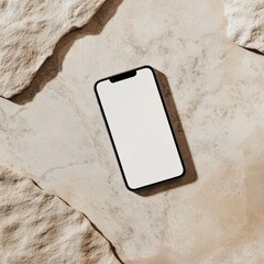 Smartphone on beige stone surface with blank screen for design mockup