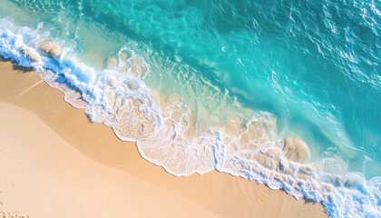 Obraz premium Gentle beach scene with soft blue waves lapping at sandy shore under tranquil golden hour lighting