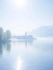 A serene alpine lake with a silhouetted church and village nestled against misty mountains, creating a dreamlike and tranquil atmosphere