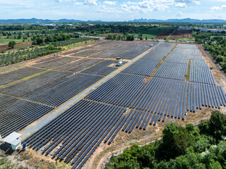 Aerial view of solar panel and power station with energy storage.