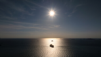 silhouette of shipping logistic cargo container ship sailing in sea to import export goods and...