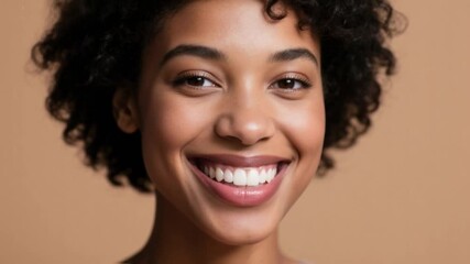 Young black woman with a radiant smile showcases perfectly white teeth, embodying excellent oral health, dental care, and aesthetics for dentistry and cosmetic concepts