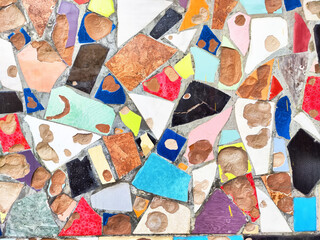 A stunning collection of colorful mosaic tiles showcases a vibrant blend of shapes and textures,...