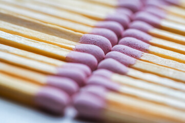 Pink matches sticks on bright background, macro photo
