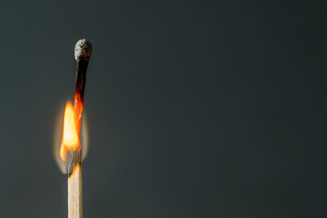 Burning match. Abstract concept of burnout in couple, copy space