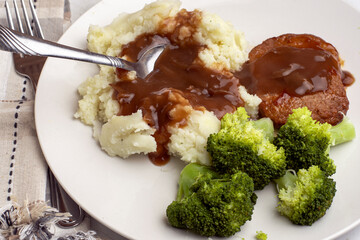 salisbury steak  with mash potatoes and gravy
