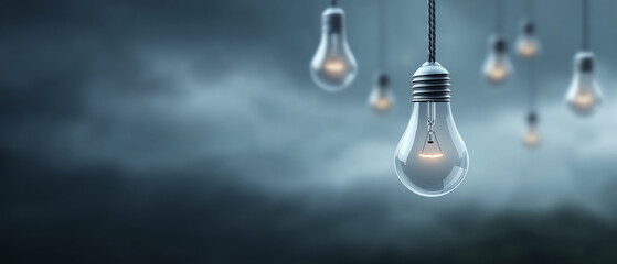 Hanging light bulb innovation creativity idea inspiration electricity technology energy focus concept