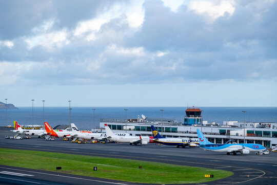 airplanes Madeira International Madeira Funchal Airport, aircraft parking, travel hub, airport scene, Aviation and Portugal travel