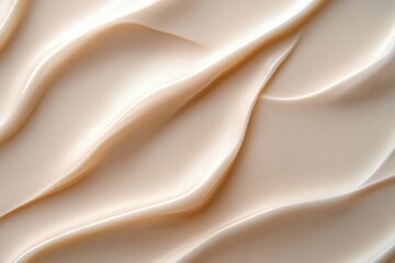 Obraz premium Close-up of smooth, creamy beige textured surface with flowing, wavy patterns and soft shadows creating a gentle, calming effect