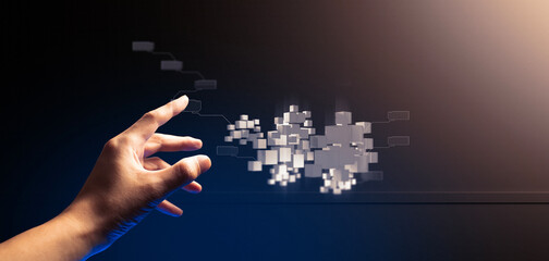 hand of businessman interactive touching a holographic of transaction financial network data...