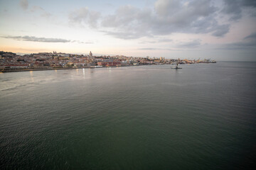 Lisbon Portugal . Sunset view of the Tagus River in Lisbon from the deck of a cruise ship departing...