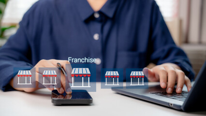 Entrepreneur managing franchise business via smartphone and laptop, illustrating digital franchise expansion, investment planning, multi-store strategy, and scalable business model.