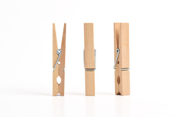 Set of Wooden clothes pin isolated on white background
