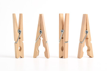 Set of Wooden clothes pin isolated on white background