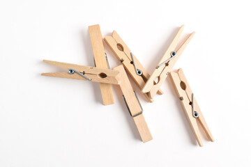 Pile of Wooden clothes pin isolated on white background