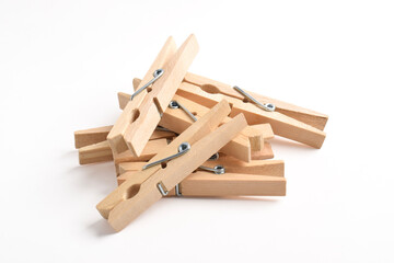 Pile of Wooden clothes pin isolated on white background