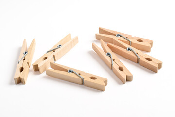 Pile of Wooden clothes pin isolated on white background