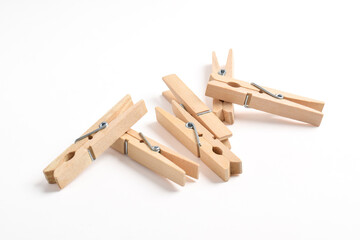 Pile of Wooden clothes pin isolated on white background