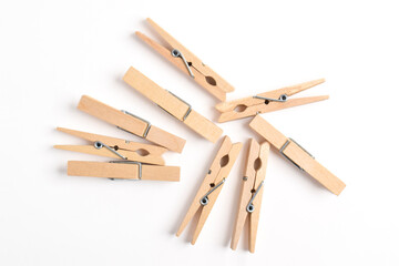 Pile of Wooden clothes pin isolated on white background