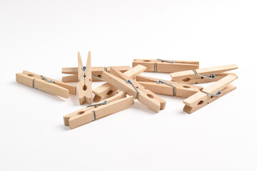 Pile of Wooden clothes pin isolated on white background