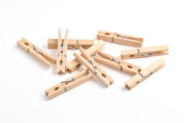 Pile of Wooden clothes pin isolated on white background