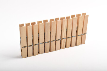 Set of Wooden clothes pin isolated on white background