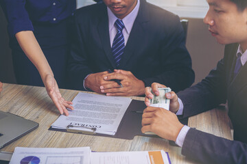 Business peoples reading documents at meeting, business partner considering contract terms before signing checking legal contract law conditions. Selected focus