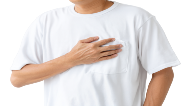 A Man Holding His Chest: A middle-aged man with a furrowed brow clutching his chest in discomfort, the image suggesting heart health concerns.