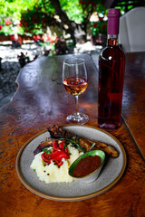 Pork ribs with mashed potatoes and sauce with wine