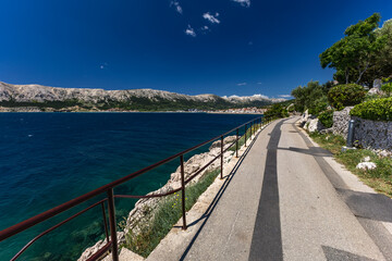 A path for cyclists and walkers along the coast in Baska on the island of KRK,