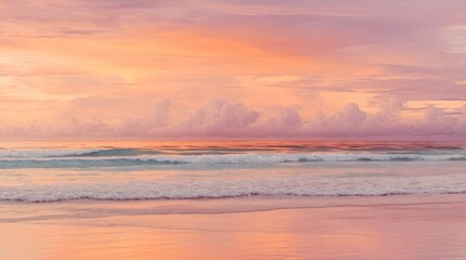 Fototapeta premium Caribbean sunset with orange and pink hues, calm waves, and a clean horizon, evoking serenity and natural beauty.