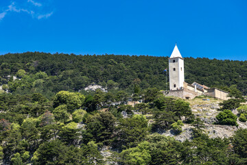 Fototapeta premium Church of St. John on a hill above the town of Baska on the island of KRK,
