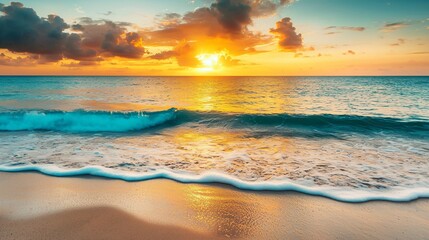 Obraz premium Caribbean sunset with orange and pink hues, calm waves, and a clean horizon, evoking serenity and natural beauty.